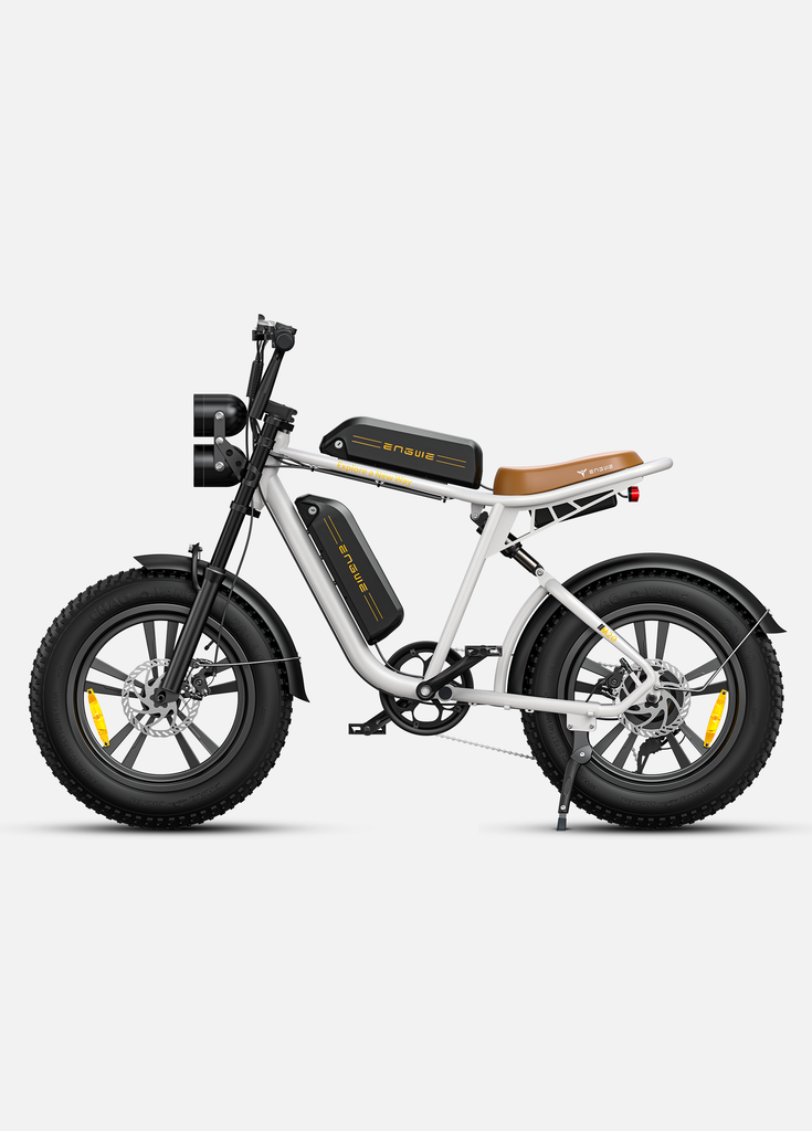 a white engwe m20 long range e bike with 2 batteries